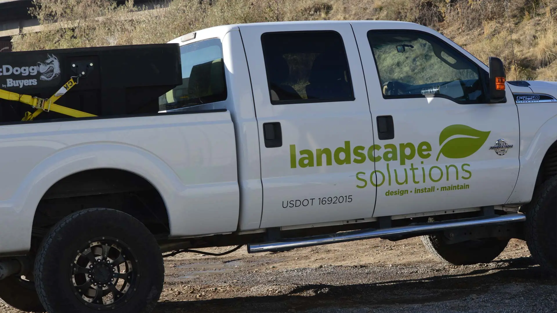 Our work truck with our contact information signage.