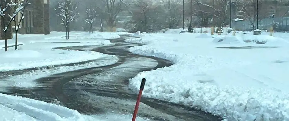 Our snow plow plowing a commercial property that is located in Salt Lake City, UT.