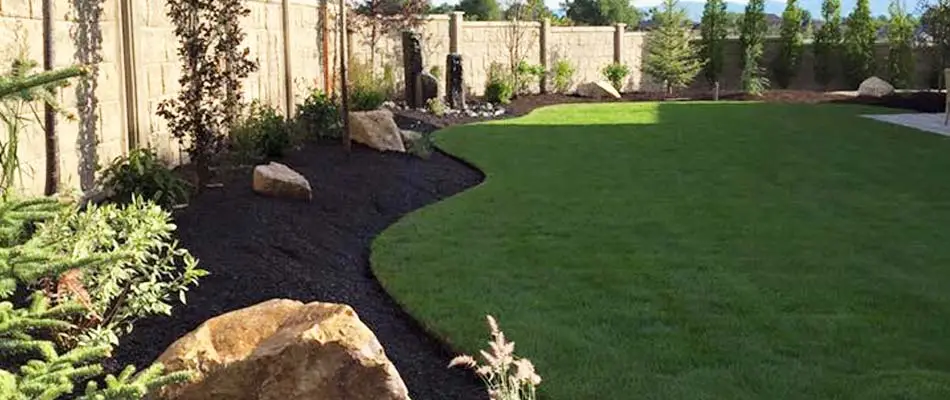 A healthy green lawn at a home located in Draper that participates in our lawn care program.